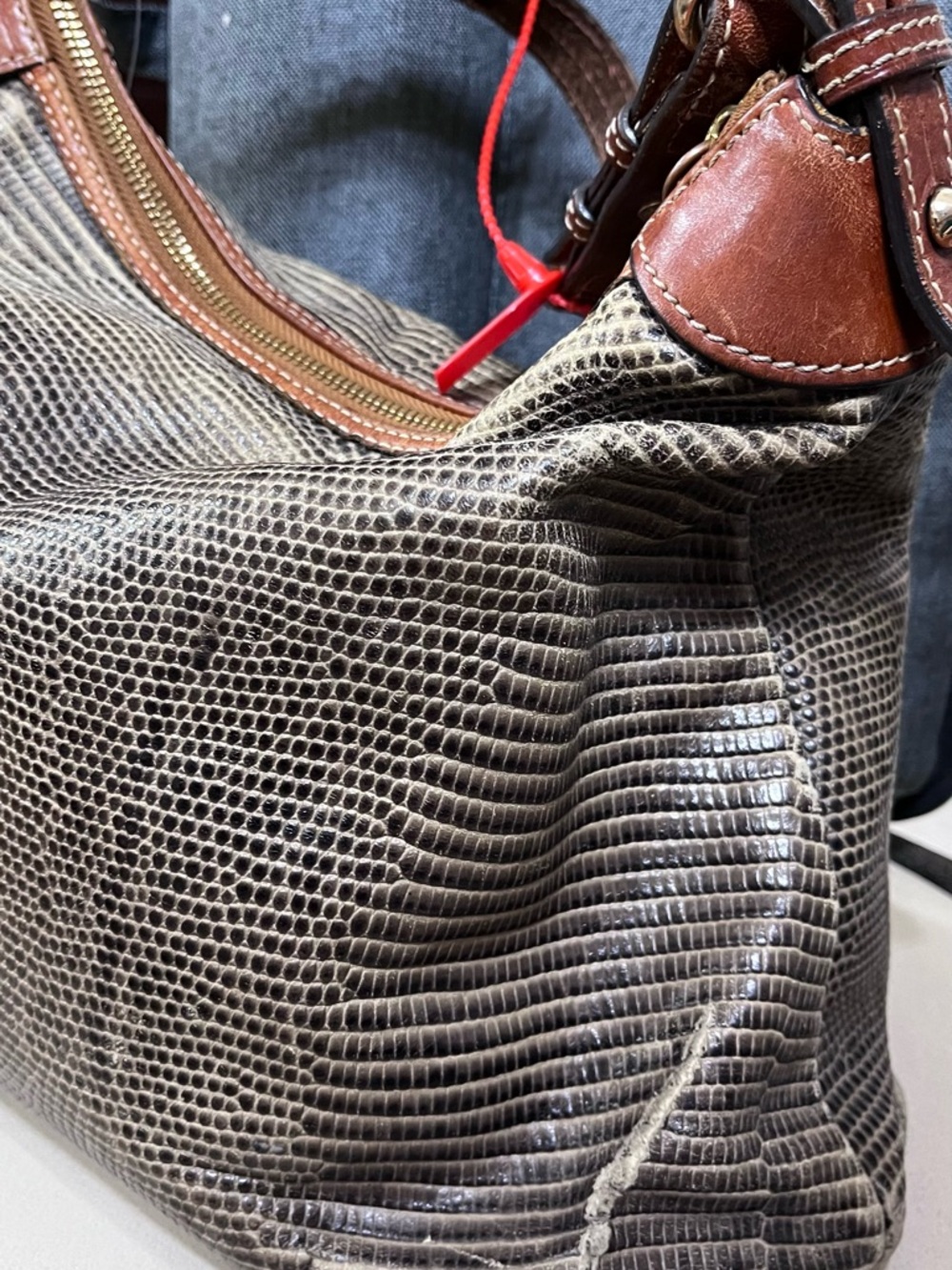 Dooney & Bourke Brown Lizard-Embossed Shoulder Hobo with Tan Trim; 

Corner wear - Picture 2 of 3